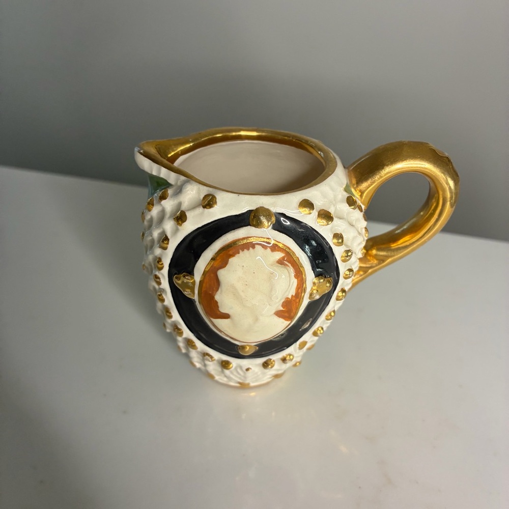 Made in Italy Elegant Gold and Black Ceramic small Pitcher with a flaw